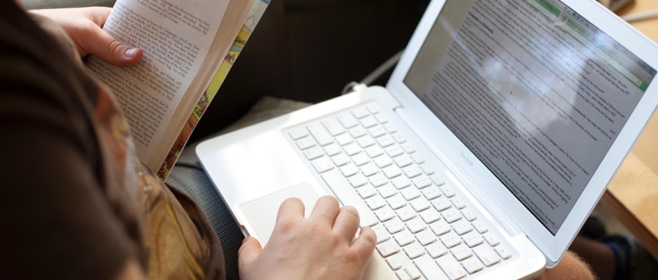 Student studying on a computer