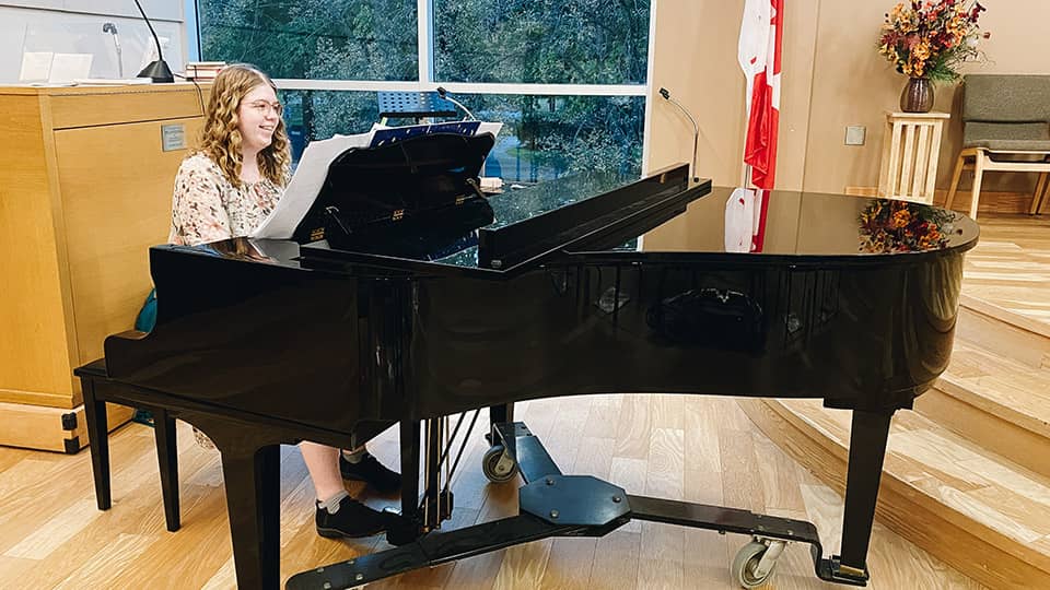 Helen Lawrence playing piano