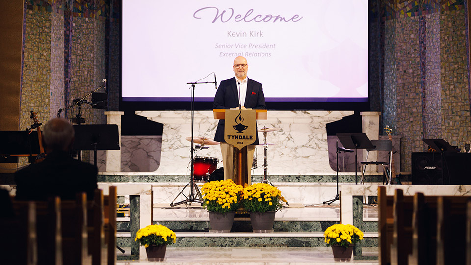 Kevin Kirk welcoming Tyndale Alumni