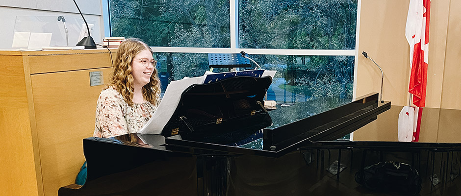 Helen Lawrence playing piano