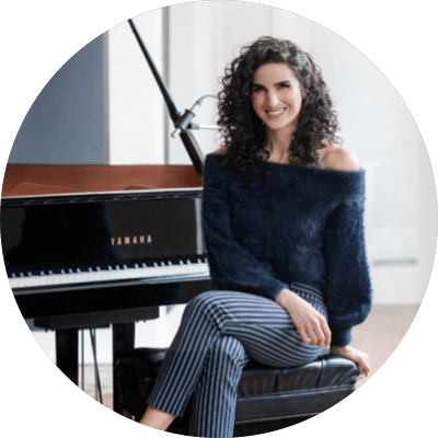 Laila Biali sitting at a piano