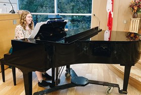 Helen Lawrence playing piano