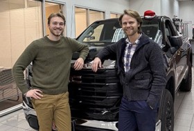 Matthew Habinski standing in front of a pickup