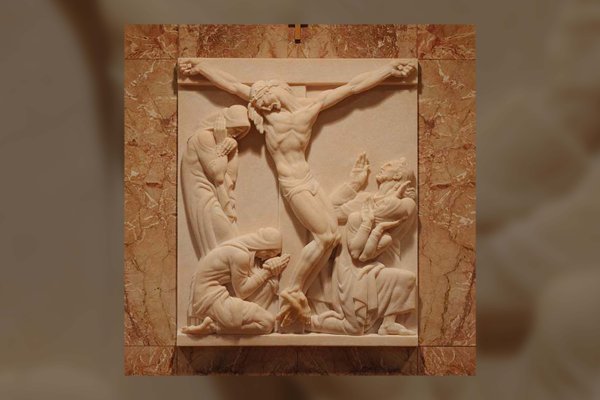 Rose marble sculpture of dying on the cross