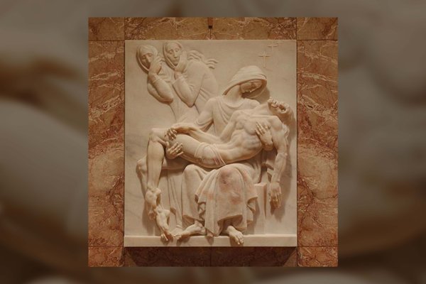 Rose marble sculpture of Jesus taken down from the cross