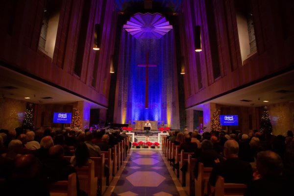 Wide angle view of the chapel featuring Marjory Kerr as the main speaker