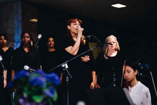 Choir member singing a solo