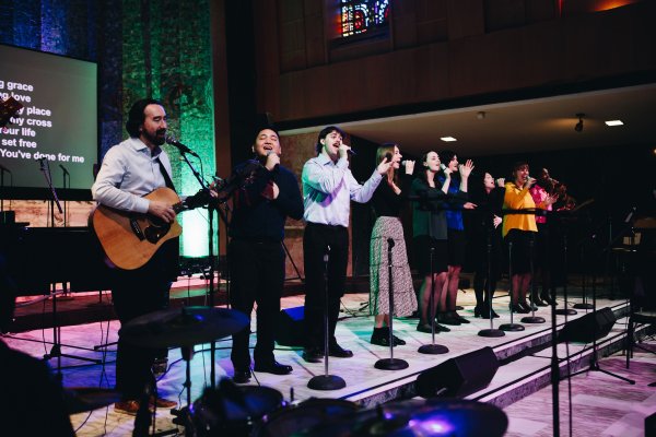 Dr. Ken Michelle and students leading worship