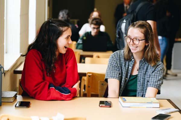 Students hanging out in the dinning room