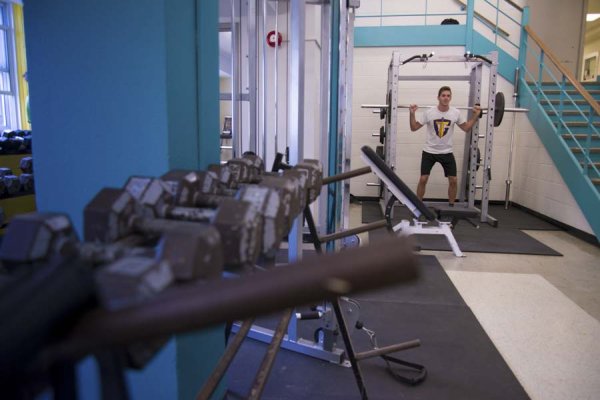 A student working out in the fitness centre