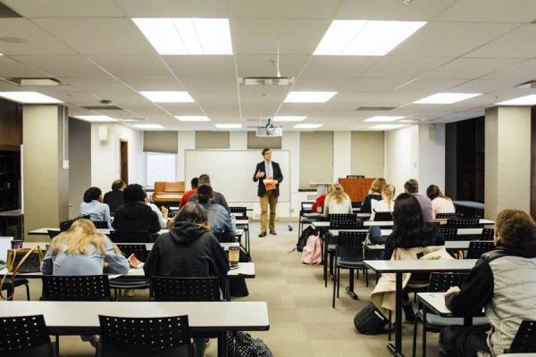 Professor teaching undergraduate classroom