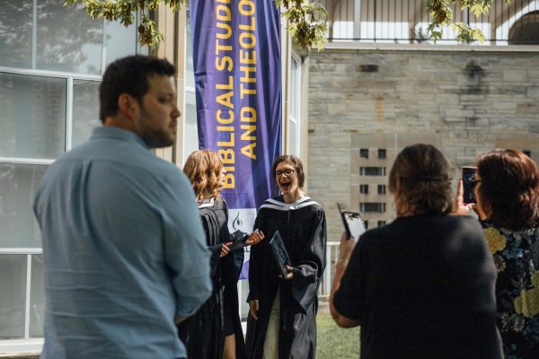 Graduates taking pictures