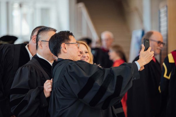 Graduates taking a selfie