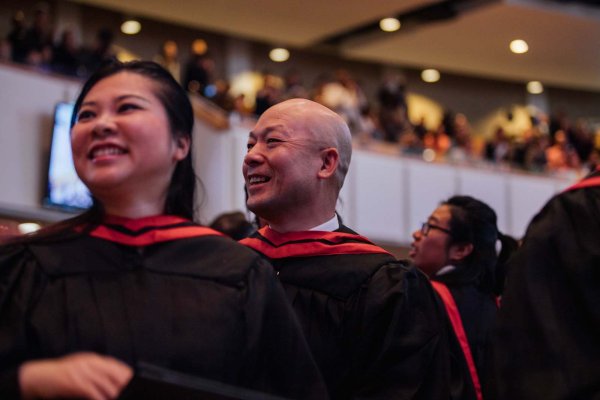 Graduates smiling