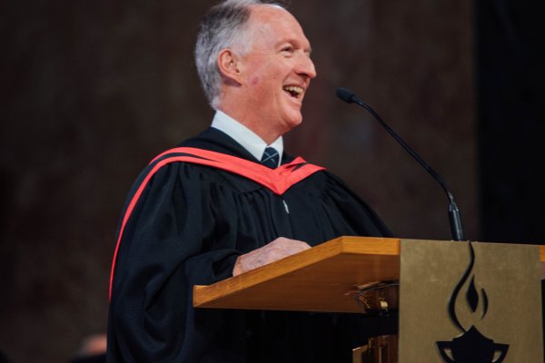 Rick Cunningham addressing the new graduates