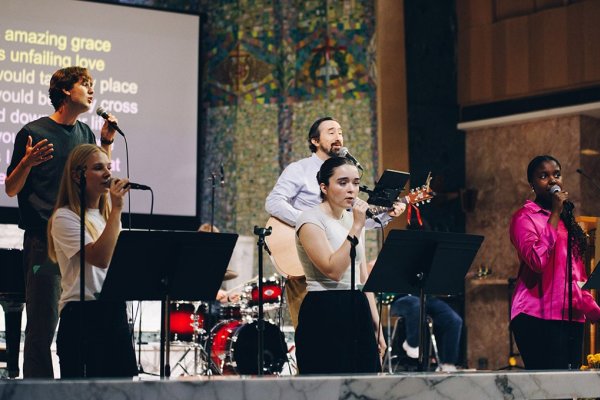 Worship band playing on stage