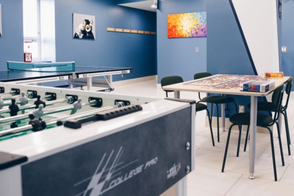 Gaming area with fuseball and ping pong tables